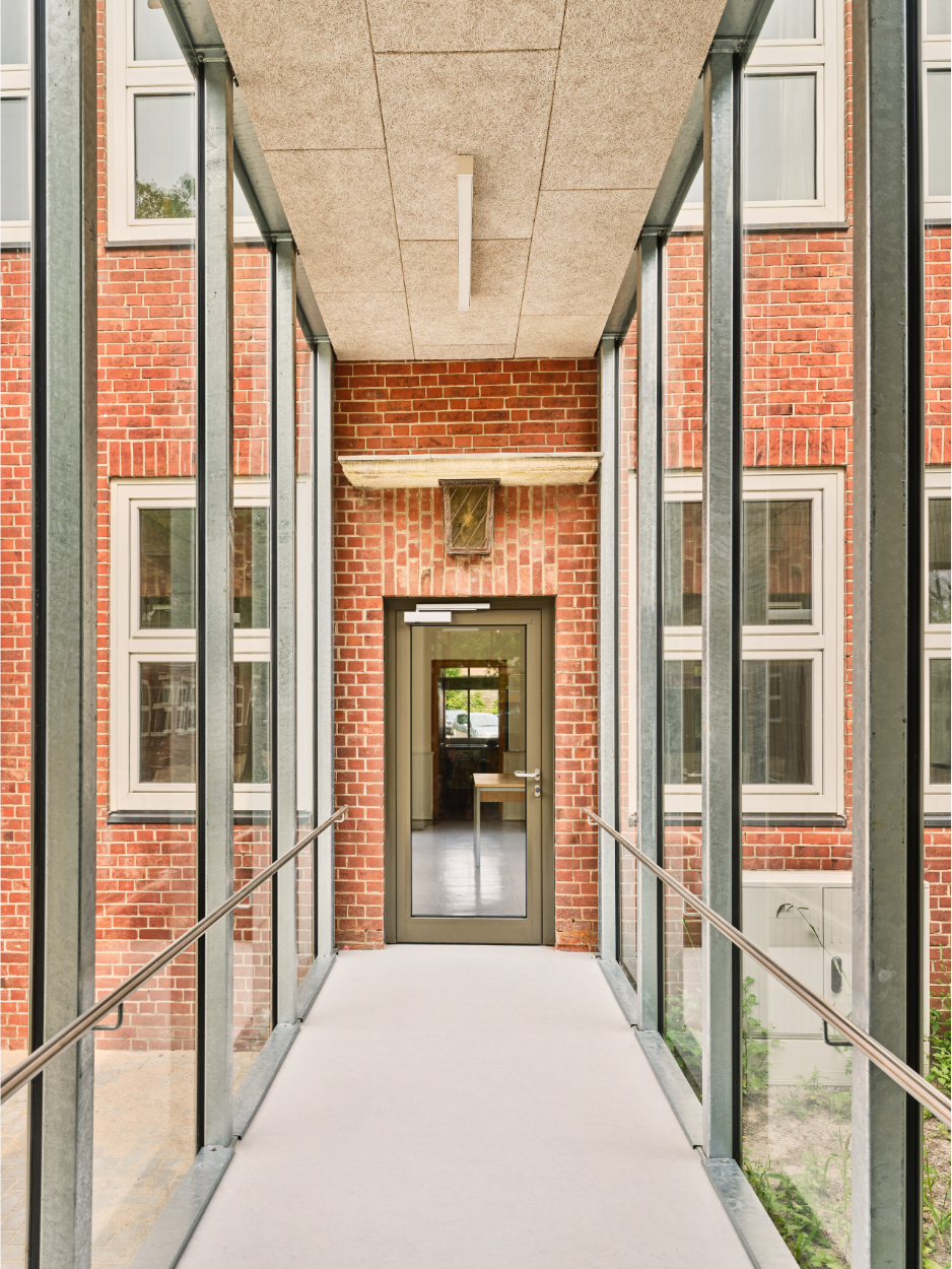 A passageway leads from the canteen to the old school building.